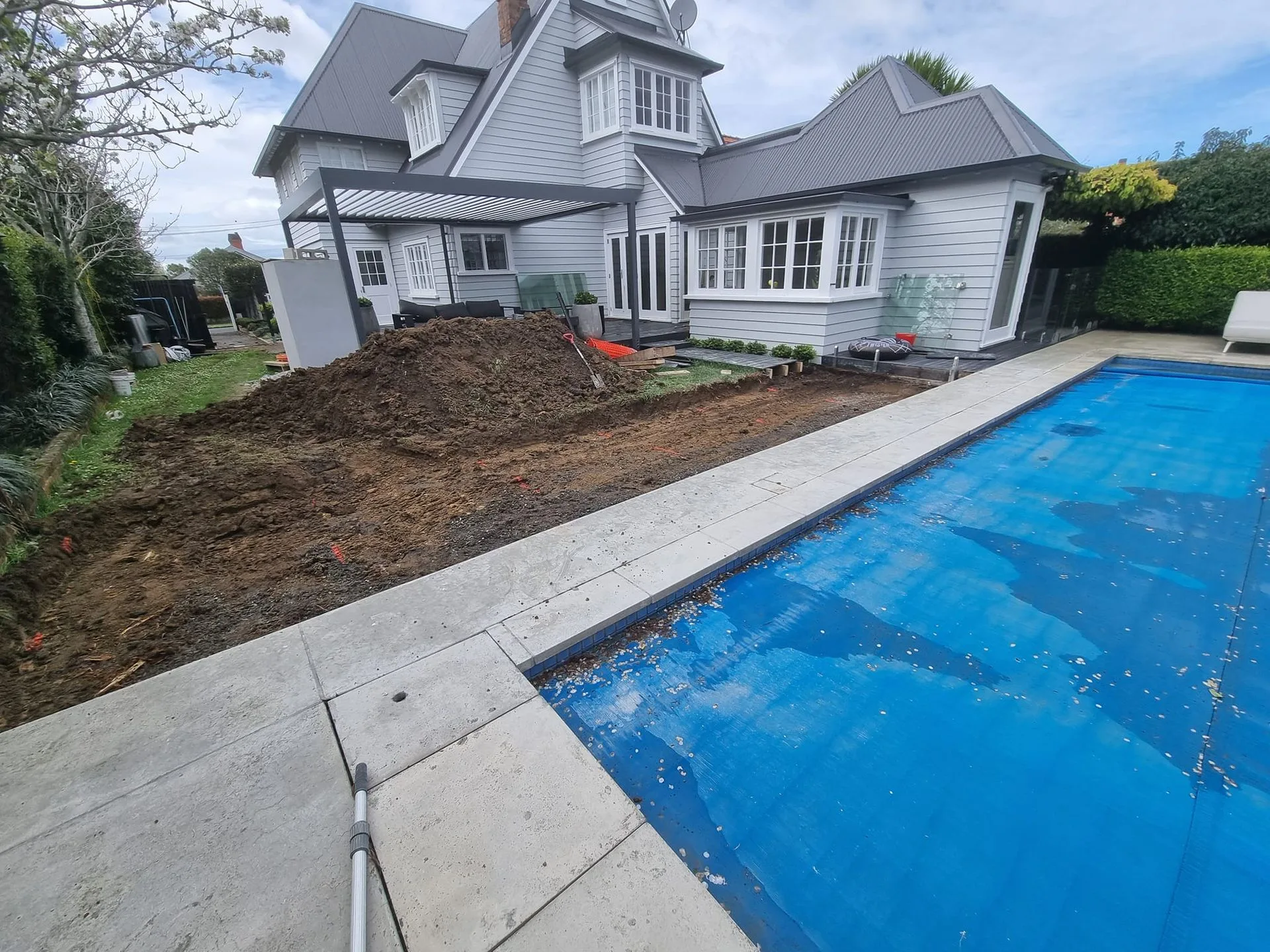 Swimming pool surround preparation